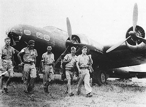 Lt. James T. Connally and the crew of B-17C Flying Fortress #40-2062 at Batchelor, Northern Territory after their first bombing raid out of Australia. Nine B-17's staged through Del Monte on Mindanao to bomb the Japanese landing at Legaspi.