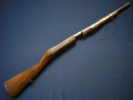 Philippine Palluntod shotgun of the type used in World War 2. Guerrillas often made shotgun cartridges from used .50 cal brass that was cut to the  length of a shotgun shell, primed and loaded with black powder, it’s projectiles used ranged from lead shot, ball bearings to glass shards and scrap metal.