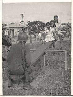 american gi playing with kids